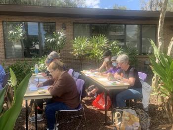 Hawthorne watercolor students enjoying an outdoor class 