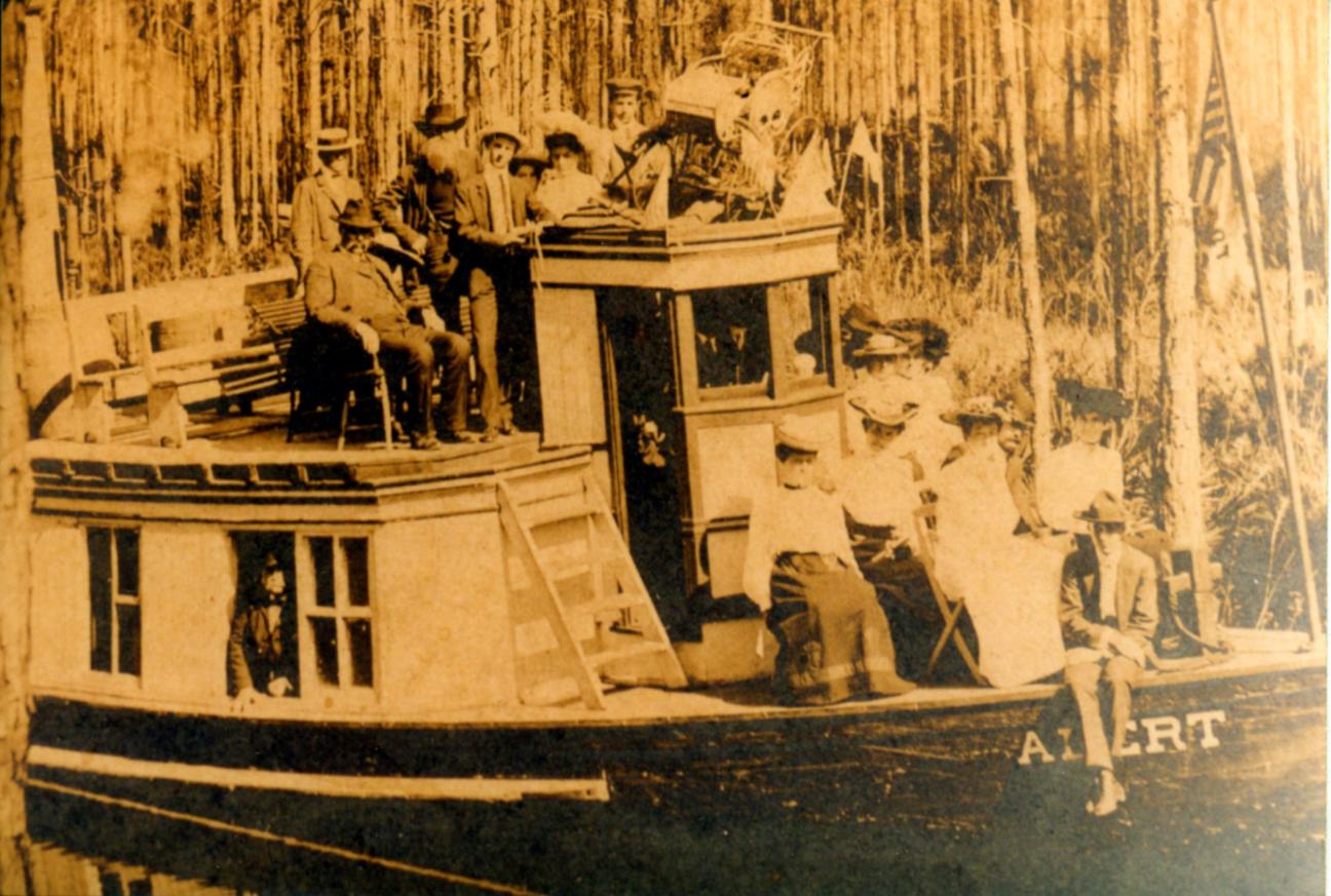 the Alert boat full of passengers on the Lake Santa Fe Canal