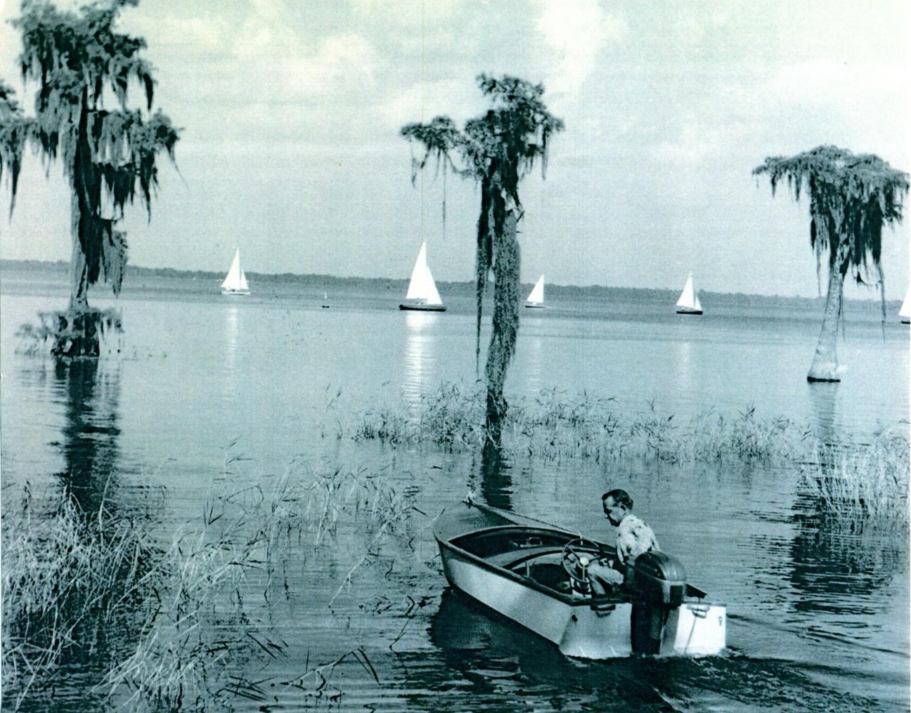 man boating away from Policeman's Dock on Santa Fe Lake