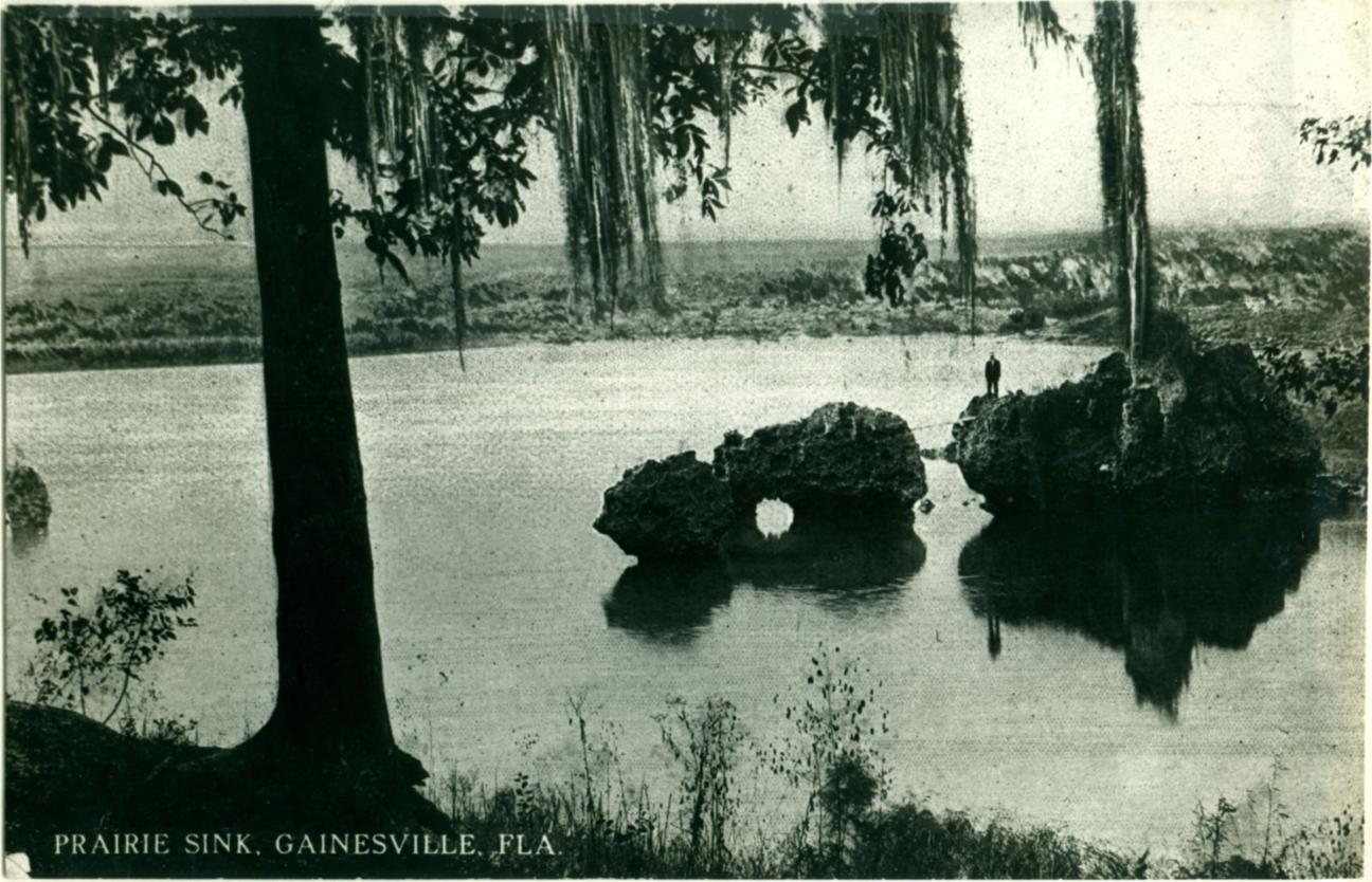 lone man on rock at Prairie Sink