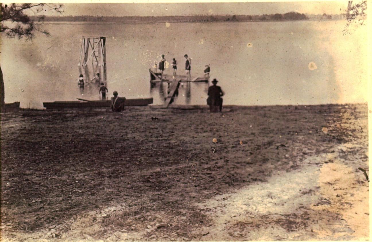 people on a dock at the Point at Newnan's Lake