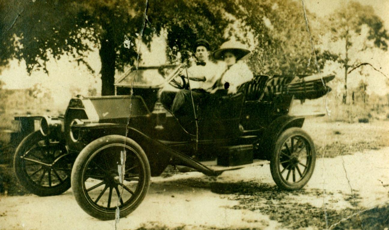 Mr. and Mrs. Chester in High Springs in car in 1910s or 1920s