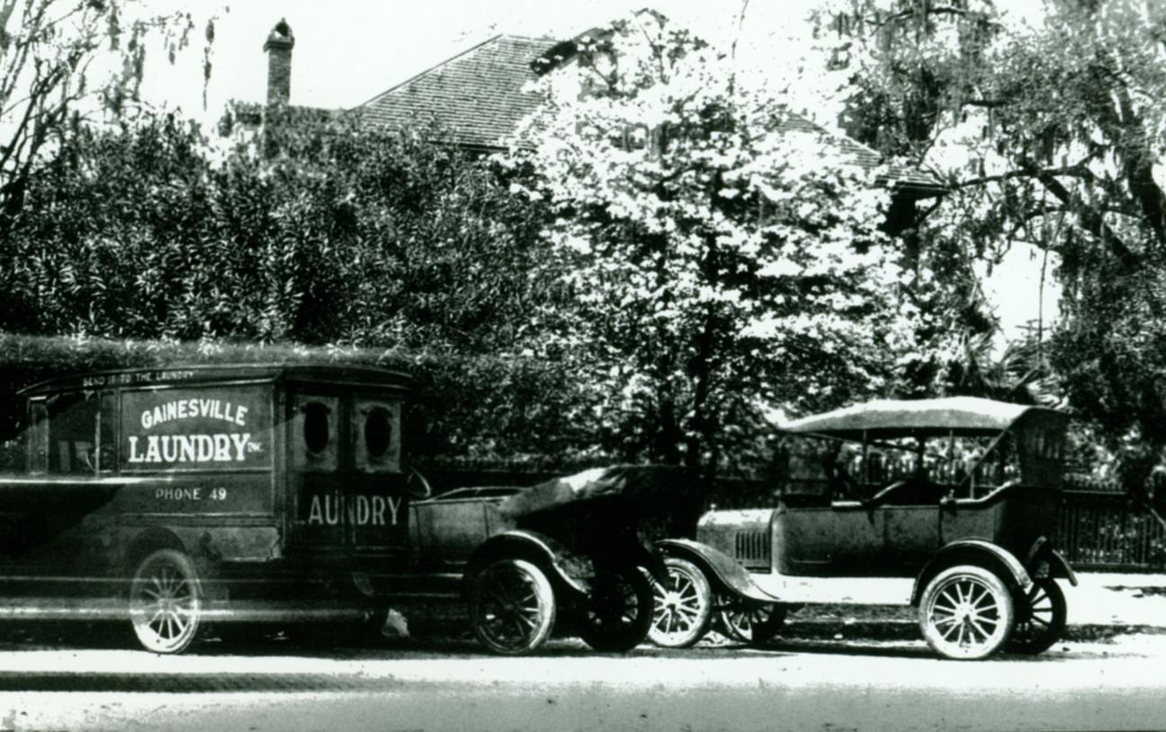 Gainesville Laundry truck and 2 other cars