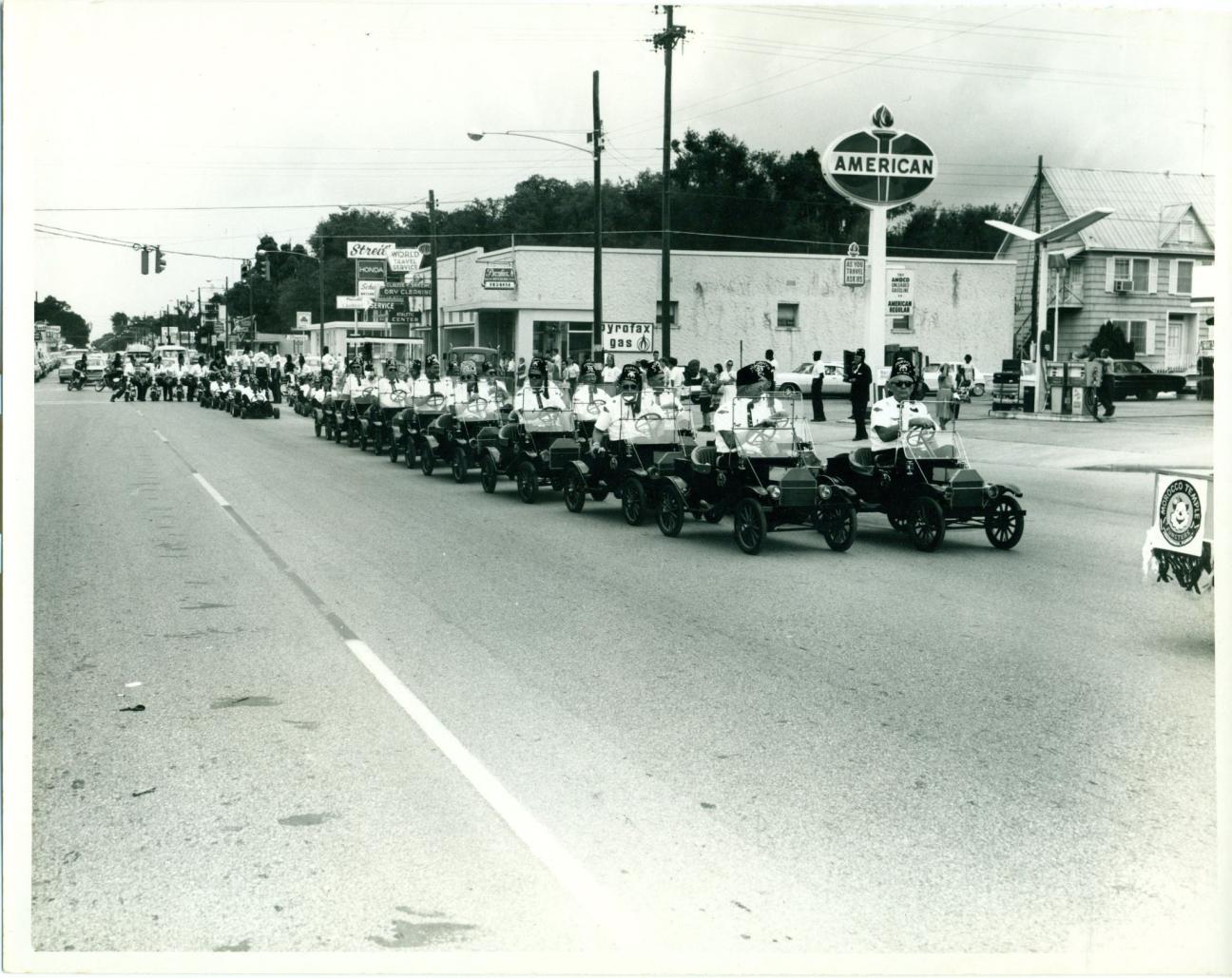 Shriners in minicar during a Gainesville parade