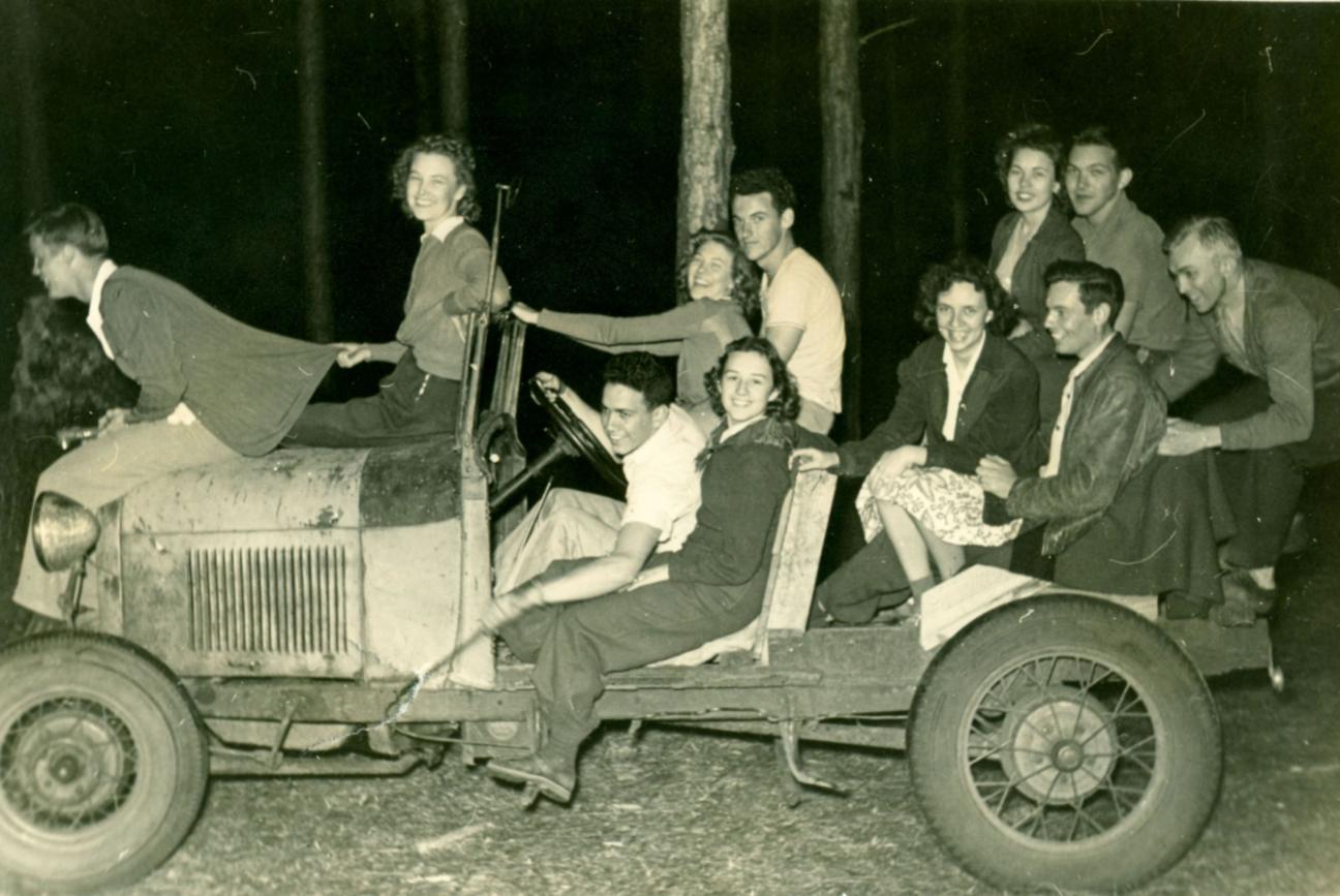 teens joyriding in a jalopy 1940s or 1950s