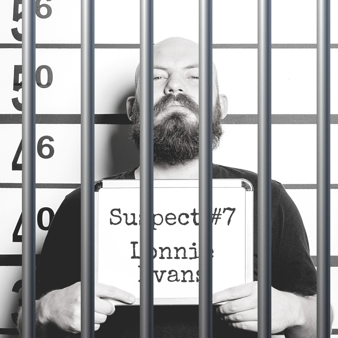 Black and white mugshot of a man with a beard holding up a board that says "Suspect #7: Lonnie Evans." There are bars over the photo.