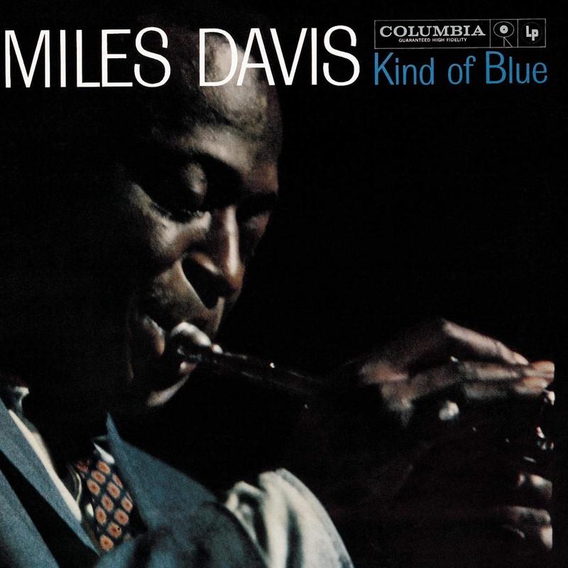 The cover of jazz album Kind of Blue by Miles Davis. His name and the album title are at the top, the background is a bust photo of Davis playing trumpet