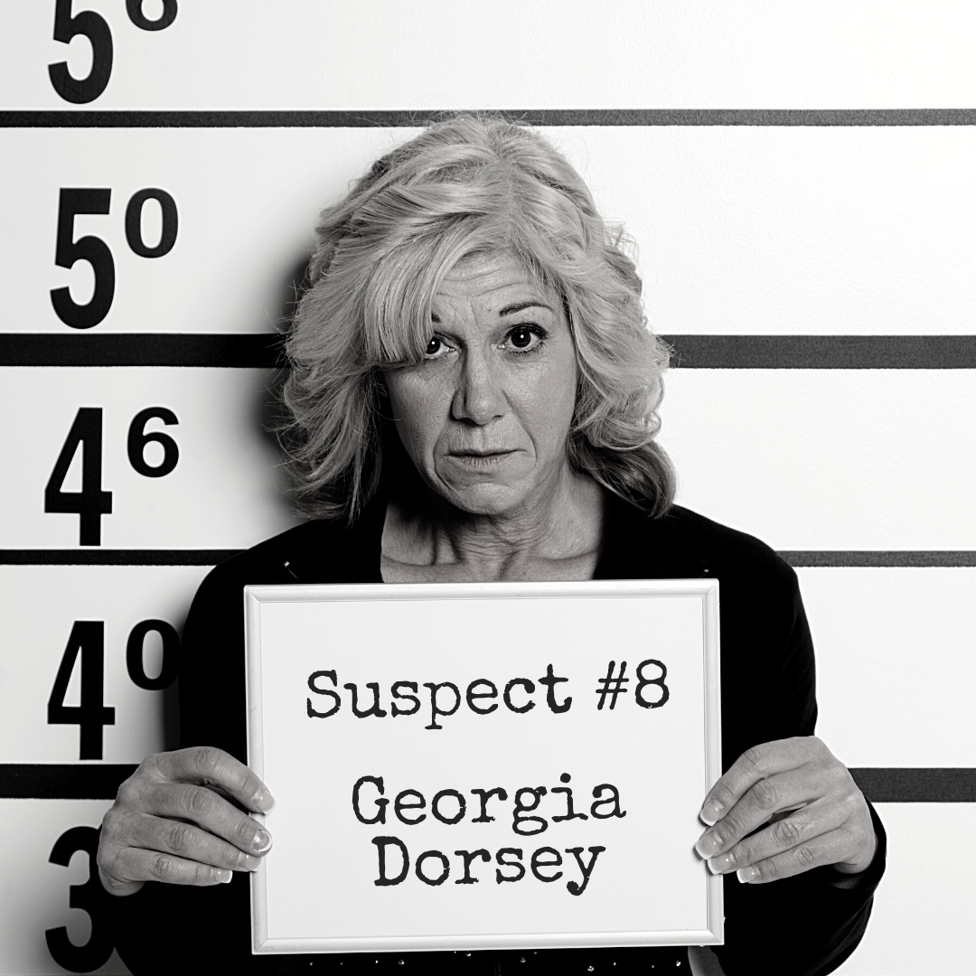 Black and white mugshot of an older woman holding a board that says "Suspect #8: Georgia Dorsey"