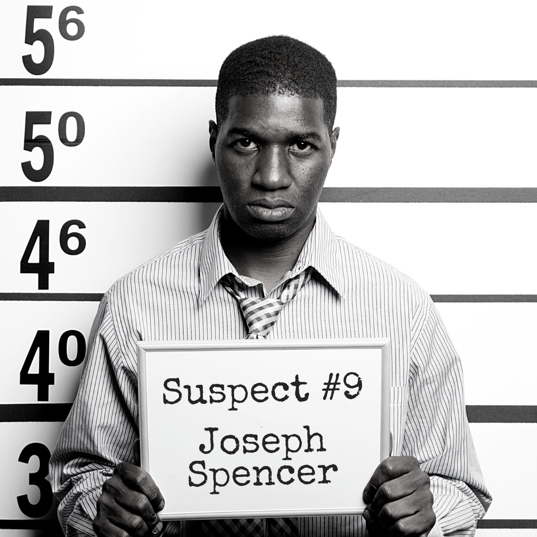 Black and white mugshot of a man in a button down shirt with a tie, holding a board that says "Suspect #9: Joseph Spencer"