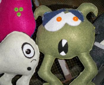 Images of felt monster plushies