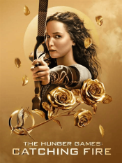 Catching Fire movie, Katniss shooting bow and arrow straight ahead, gold mocking jay pin, gold roses